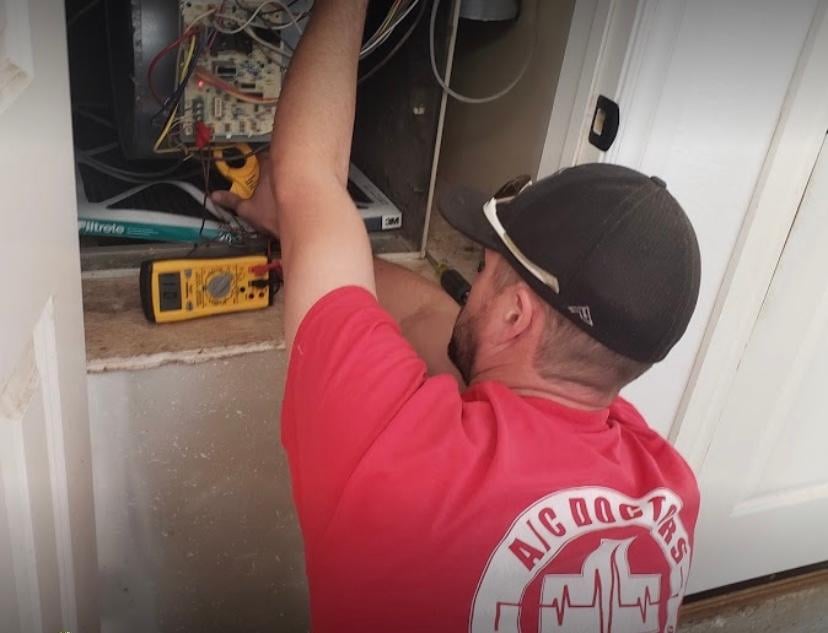 Contractor working on furnace